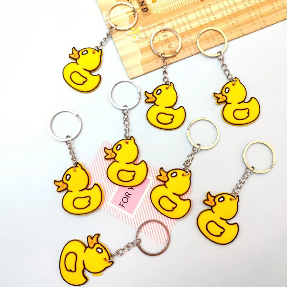 Wholesale cartoon PVC soft rubber little yellow duck keychains, personalized pendants, small gifts and cute accessories Specification image