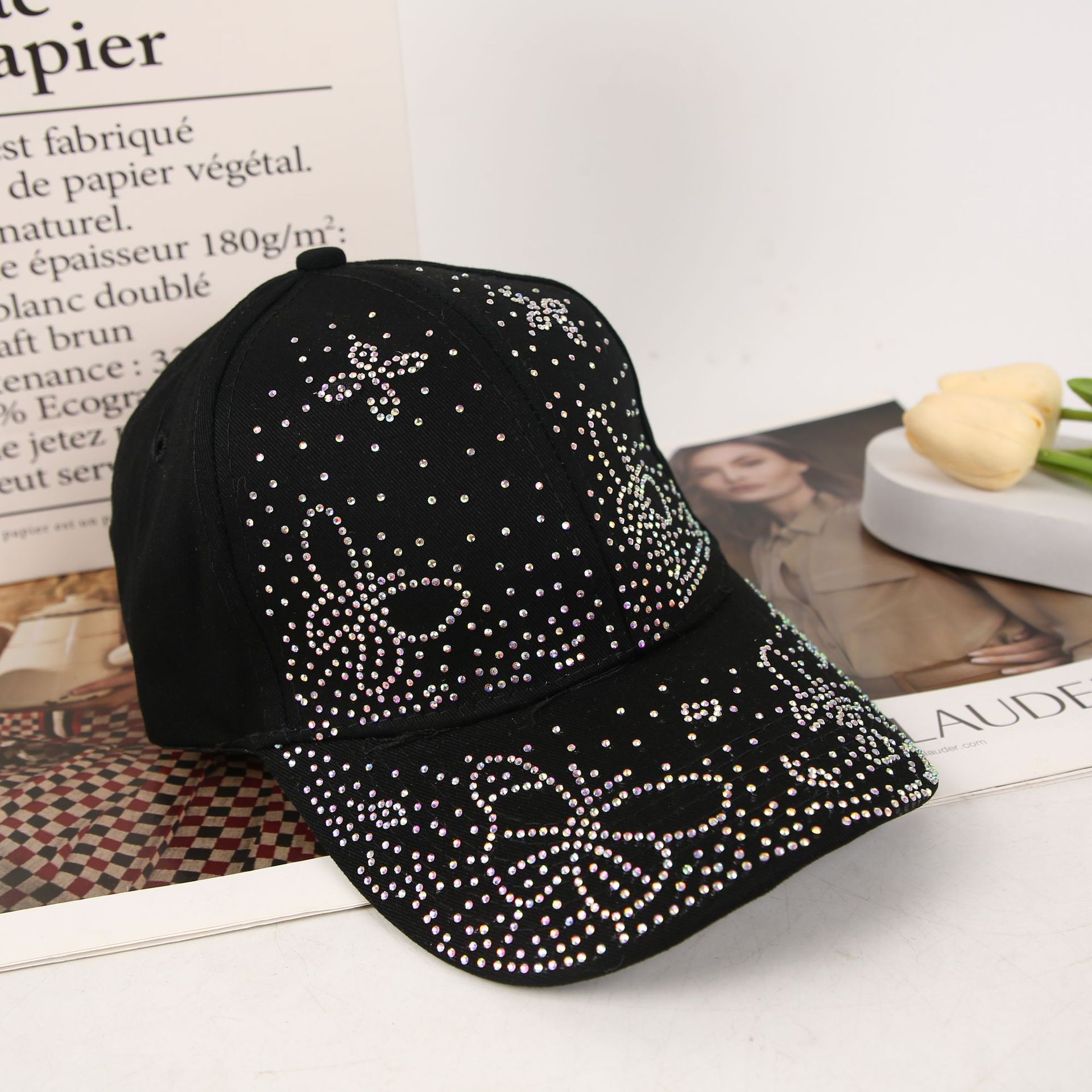 A new fashionable baseball cap with a light luxury water diamond butterfly for women. It is a versatile, casual and stylish shade baseball cap for women