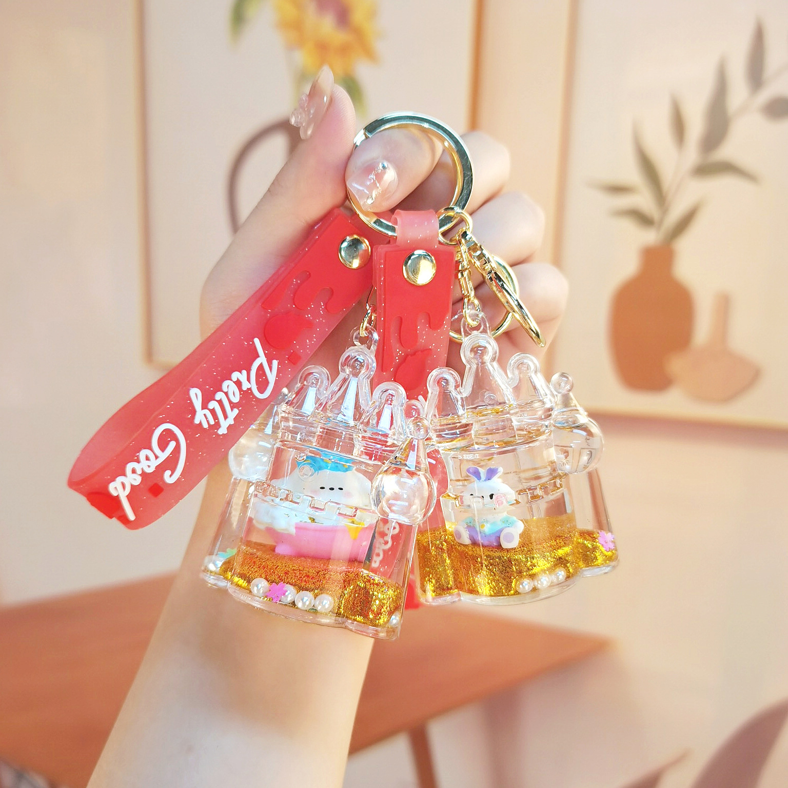 入油可爱城堡流沙瓶钥匙扣精致包包挂饰生日礼物地摊爪机礼品批发