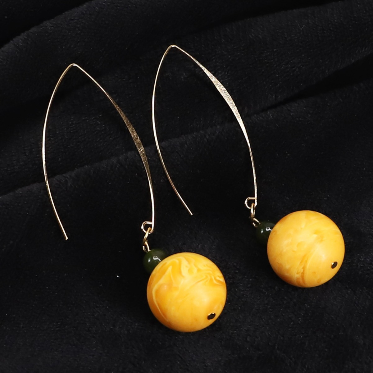 Trendy and personalized beeswax balls, Dongling jade ear hook long creative long hook earrings, ethnic style accessories, female Internet celebrity charm Application Scenario