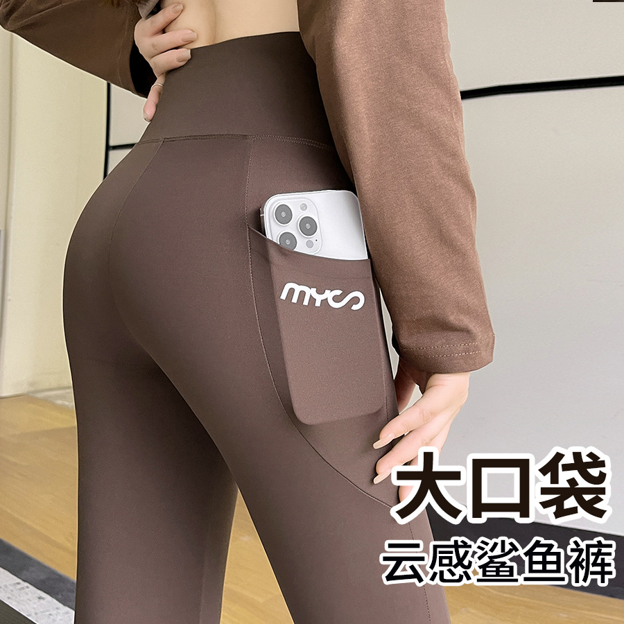 Barbie pants and shark pants are thin, high-waisted, hip-lifting and slimming women's outerwear in autumn. They are suitable for yoga exercises with pocket leggings full figure