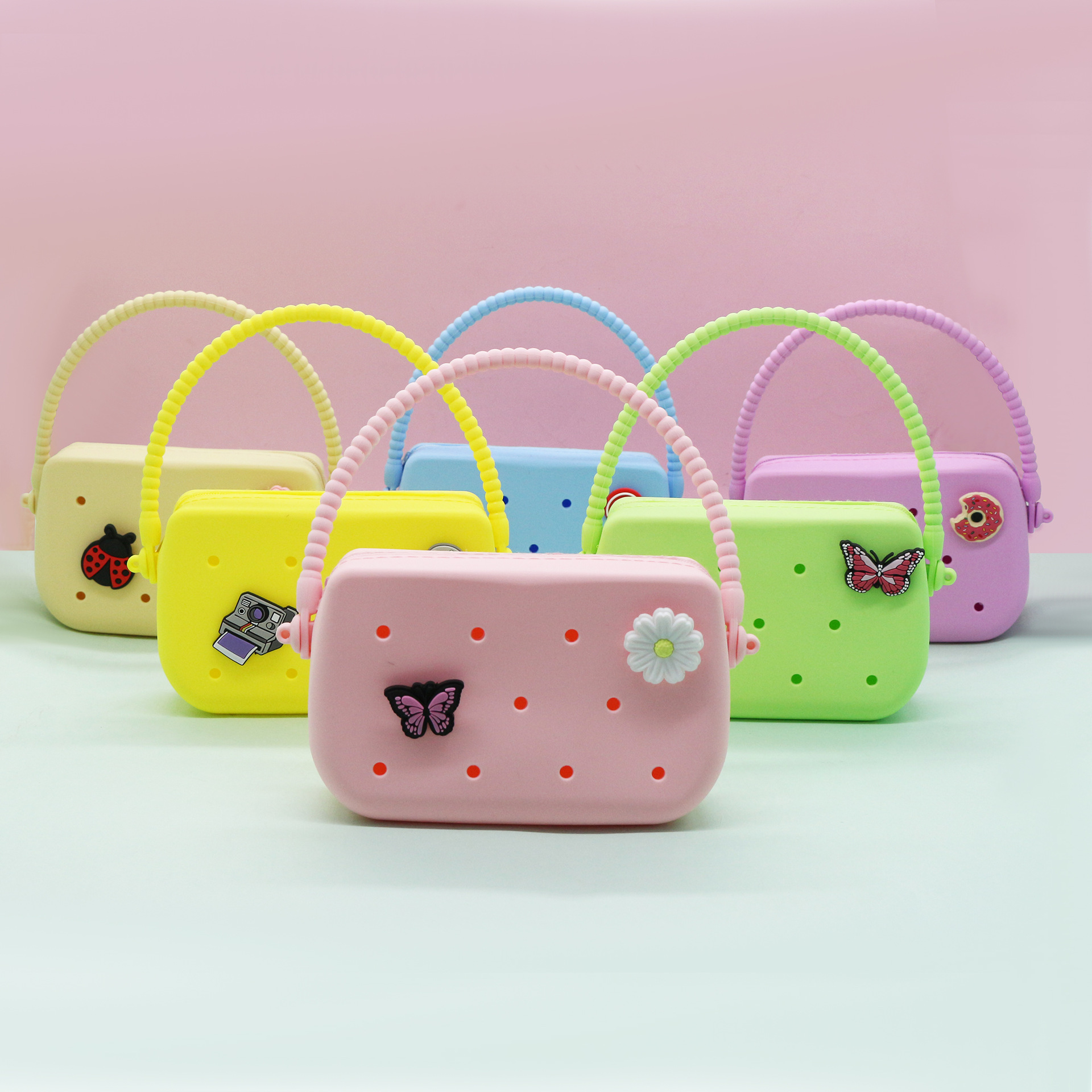 In-stock cartoon silicone hole bags, mini coin purses, diy storage bags, earphone cases, keychains, pendants and gifts details Picture