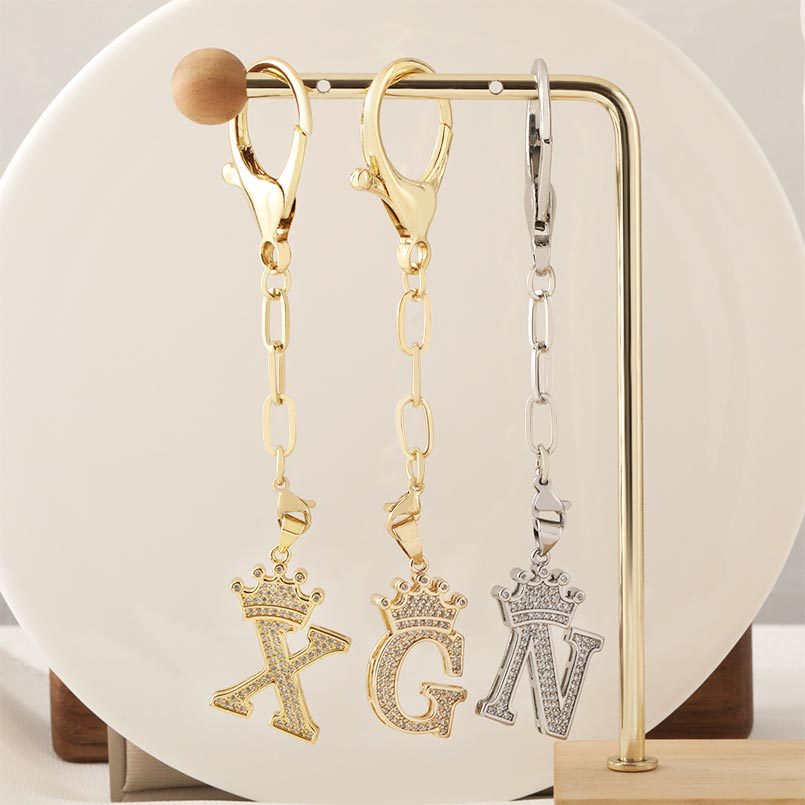 Zirconium-inlaid cross-border 26 English crown letter keychain women's European, American and Korean style fashionable bag pendant wholesale details Picture