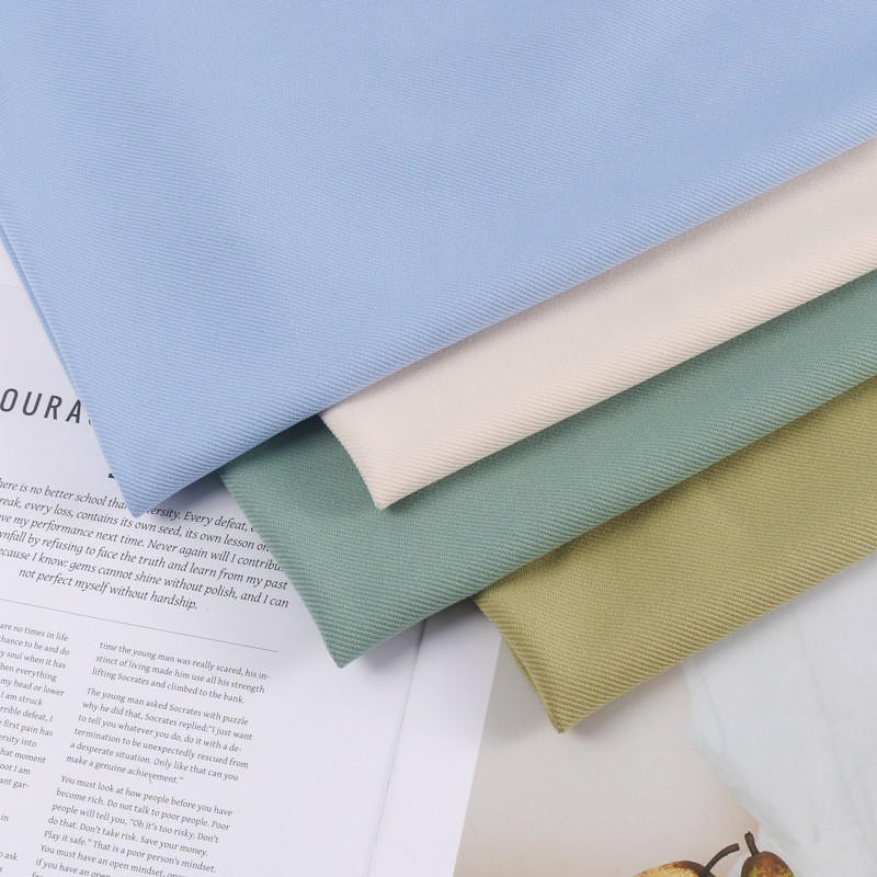 斜纹针织面料涤纶西装裤装汉服时装系列梭织弹力斜纹布料产品图