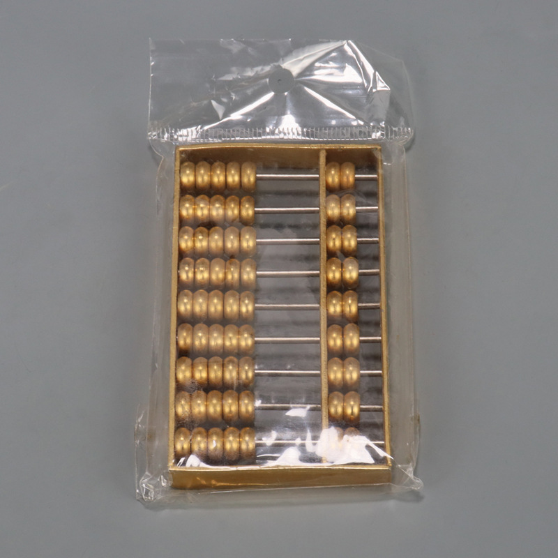 An old-fashioned abacus made of pure copper, a small collectible for antiques Application Scenario