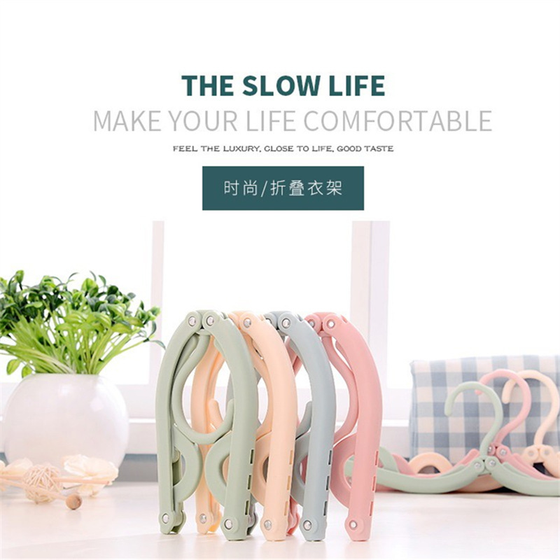Wholesale of multi-functional magic travel folding clothes drying rack, portable children's storage plastic clothes rack, support and hanging rack details Picture