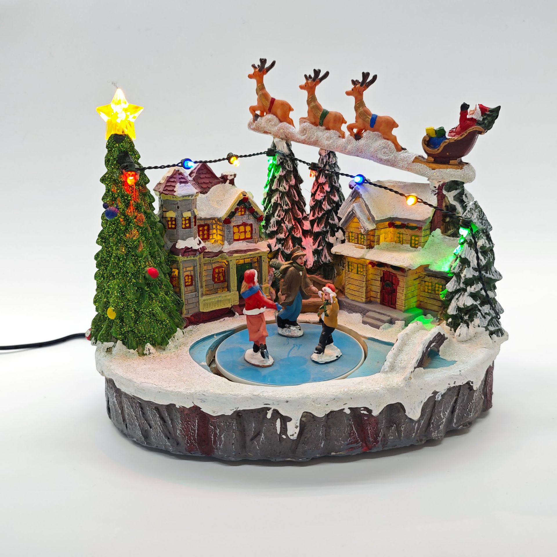 Cross-border Christmas gifts, glowing music, house ornaments, Christmas trees, skating scenes, Santa Claus, flying deer decorations