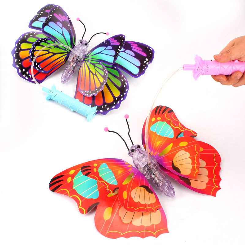 New electric butterfly children's toy with luminous hand-held wings, luminous music, moving and flashing butterfly wholesale Item Picture