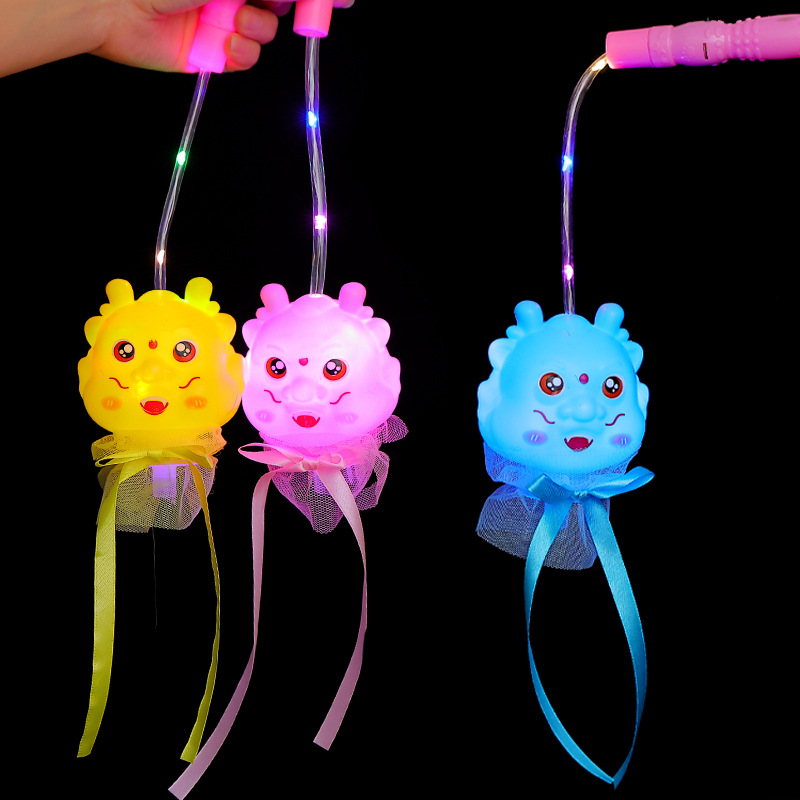 New hand-held lanterns for the Year of the Dragon 2024, featuring little dragon figures, children's luminous toys and flashing lanterns, are available for wholesale at night market stalls Application Scenario