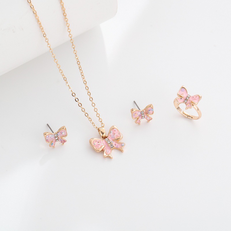 New cartoon bow necklace, ring, stud, three-piece set, children's alloy oil drip jewelry set wholesale