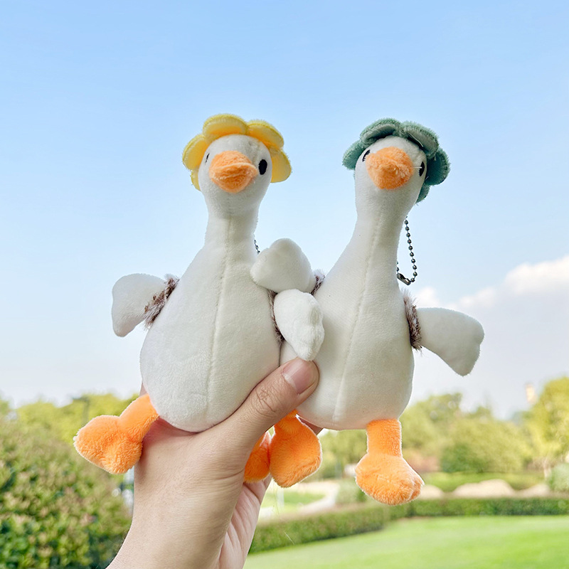 Douyin's popular big white duck plush toy keychain pendant, cute and adorable flower backpack, duck doll schoolbag hanging decoration Application Scenario