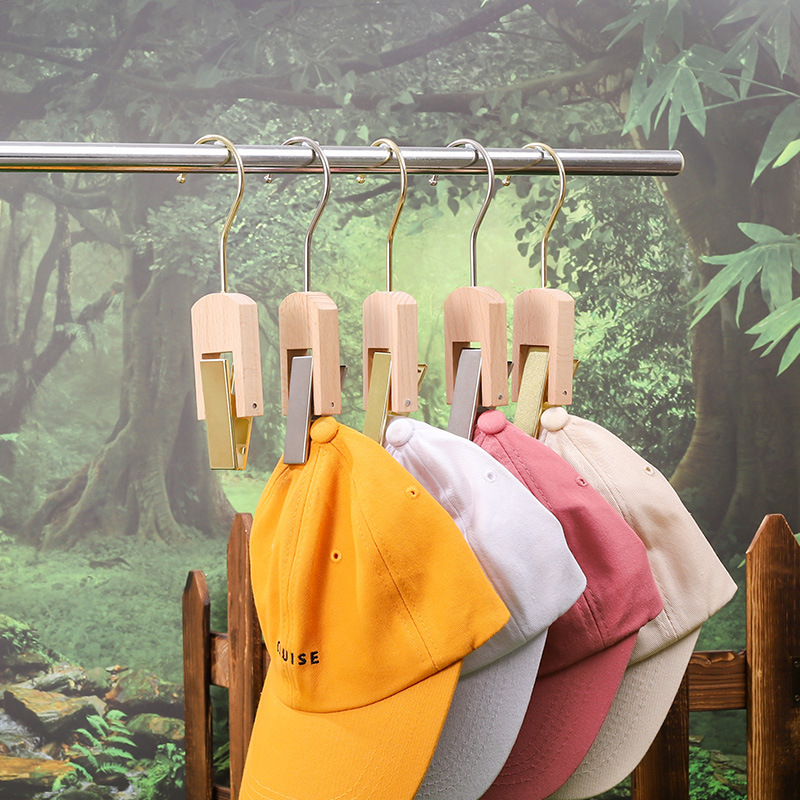 Solid wood beech wood hook clamp S-hook clothing store hat hanging decoration prop clamp rotating wooden clip Application Scenario