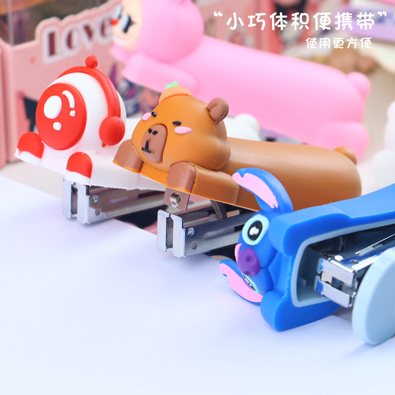 Creative cartoon astronaut shaped stapler, cute silicone creative stapler, student small size binding machine details Picture