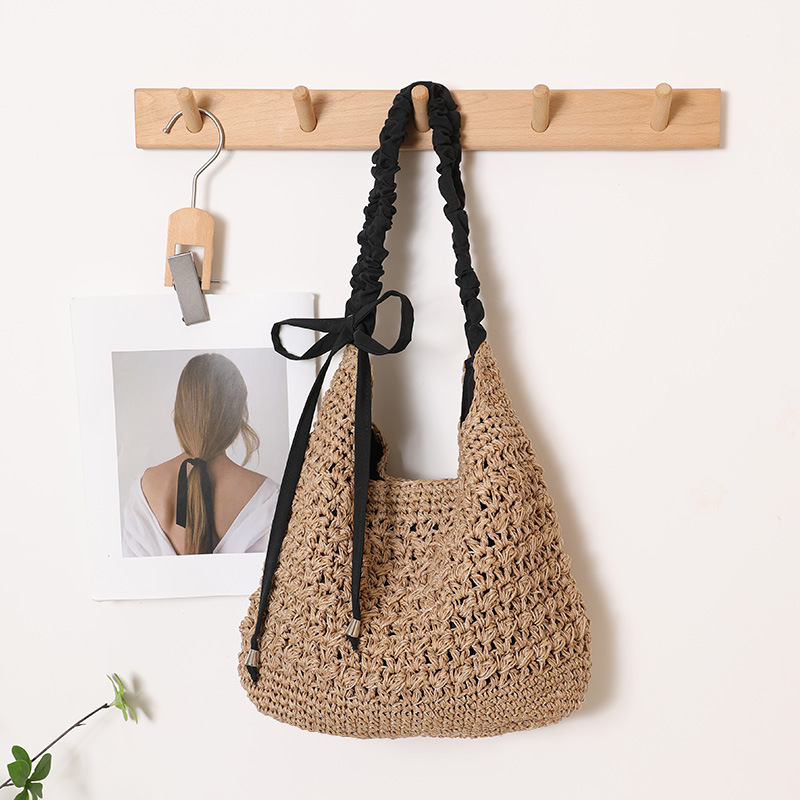 Fashionable large-capacity single-shoulder straw woven bag, new hollowed-out bow straw woven bag, women's beach vacation bag details Picture