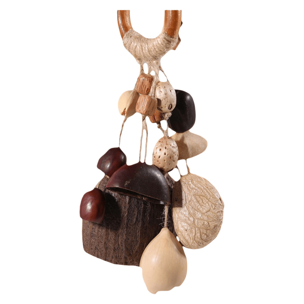 Indonesian handmade fruit shell wind chimes, natural Musical Instruments, sound therapy hand-cranked bells, fruit shell cranked bells, diy wind chime bags, hanging ornaments Item Picture