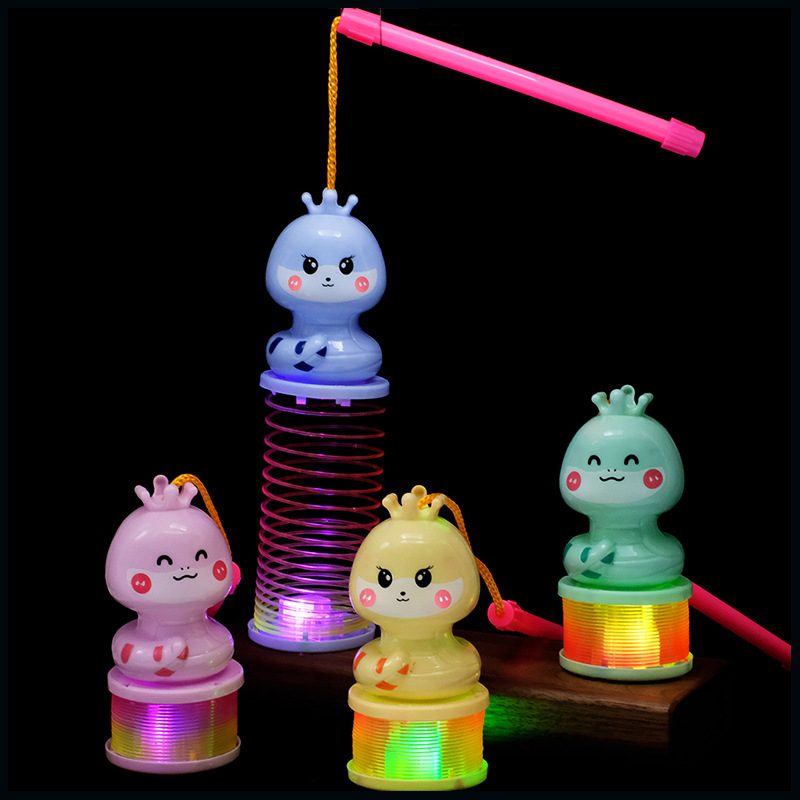 Snake Year lantern Rainbow Ring Cross-border exclusive supply of cartoon snake baby luminous elastic rainbow ring spring ring toys wholesale Application Scenario