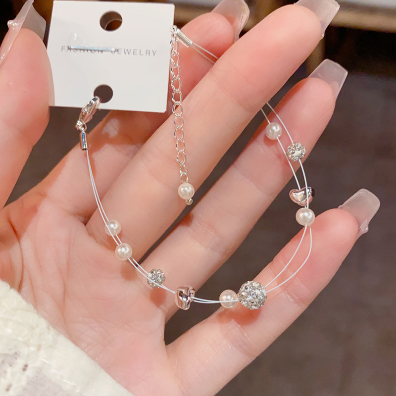 Verano nuevo lleno de diamante bola bola perla doble línea de pesca pulsera temperamento moda simple luz diseño de lujo sentido de la mano accesorios details Picture