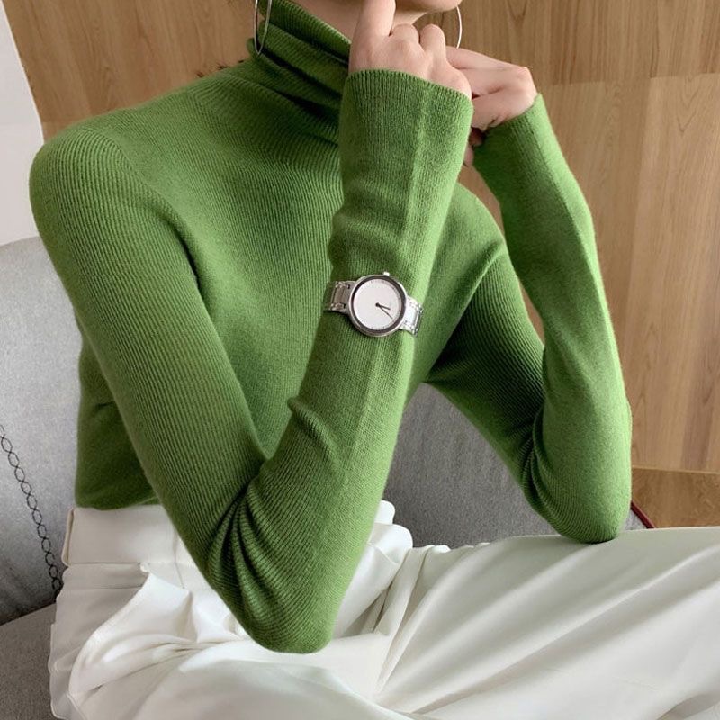 A stylish and fashionable semi-high-neck knitted top for women in autumn and winter. It's a slimming long-sleeved top with a mid-neck and a sweater underneath Application Scenario