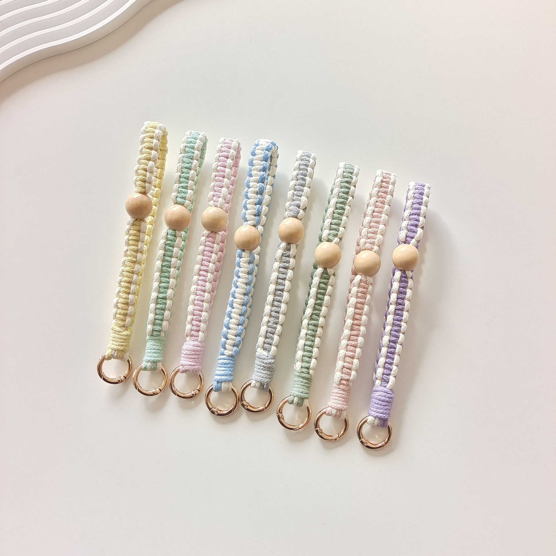 Factory direct sales of cross-border wooden bead woven mobile phone lanyard, Bohemian vacation style woven car keychain pendant details Picture