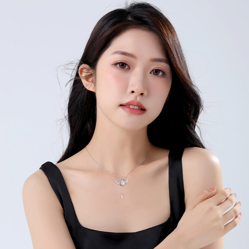 s925 sterling silver Angel Wings Mosang Necklace, a fashionable and niche women's Cupid Heart Wings movable necklace