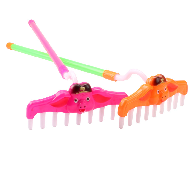 Piggy babe rake de cerdo rastrillo de picos brillante rastrillo musical viaje al oeste novedad brillante juguetes puestos de piso juguetes de venta caliente Item Picture
