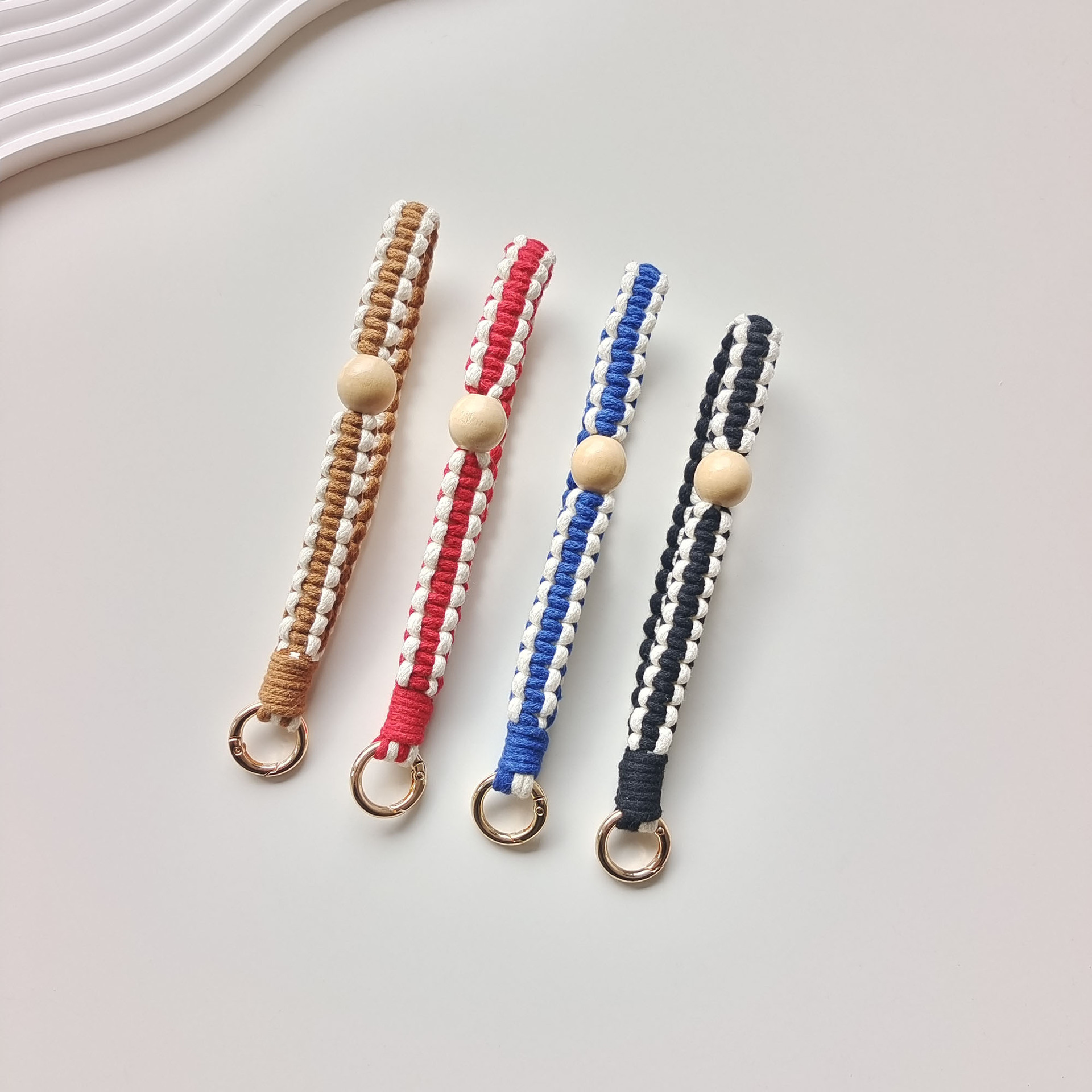 Factory direct sales of cross-border wooden bead woven mobile phone lanyard, Bohemian vacation style woven car keychain pendant Specification image