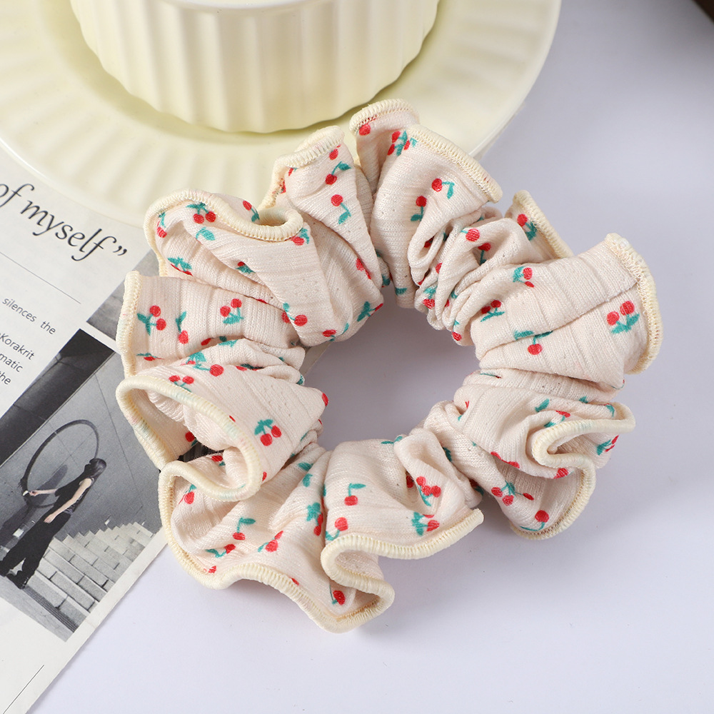 Wholesale of autumn and winter small floral hair bands, Korean-style knitted large intestine bands, high-elasticity and durable, sweet school-style ponytail hair ties Specification image