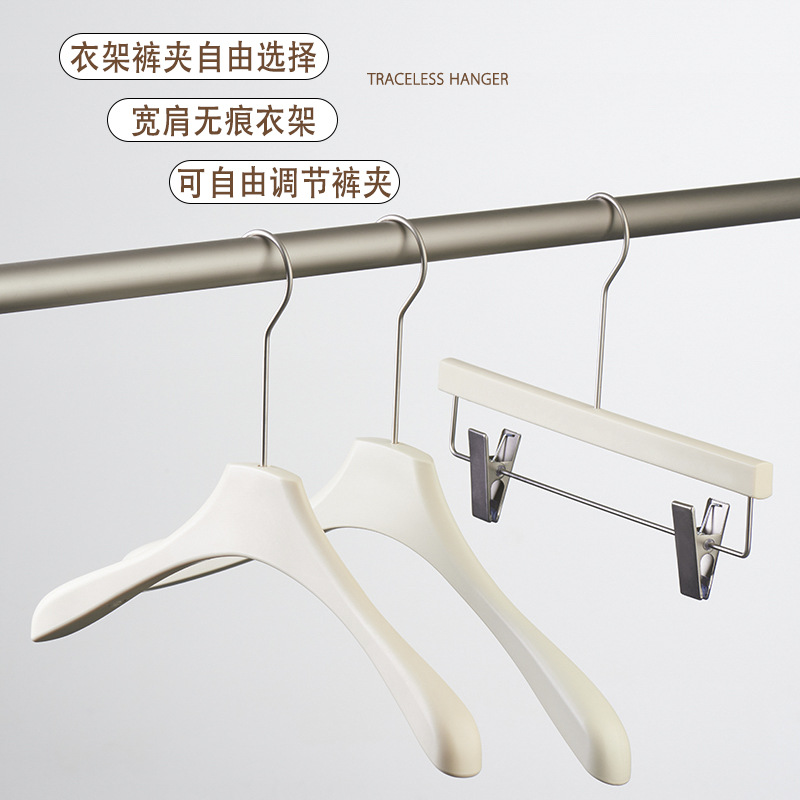 Wholesale wood-like off-white anti-slip and traceless clothes hangers for light luxury women's clothing stores details Picture