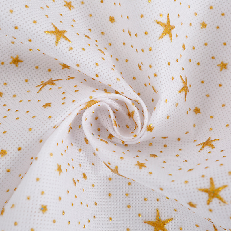 Little Star Gold-embossed polypropylene non-woven fabric in stock: Clothing lining, home textile non-woven fabric