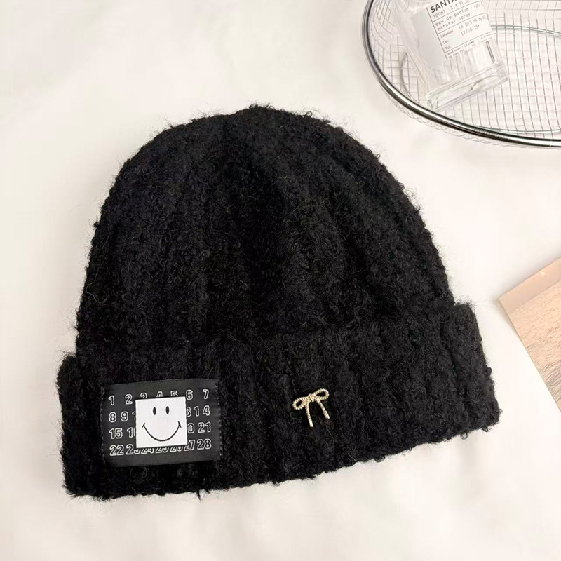 Korean niche solid-color twisted teddy fur face-enhancing small knitted hat, warm cold hat, autumn and winter woolen hat