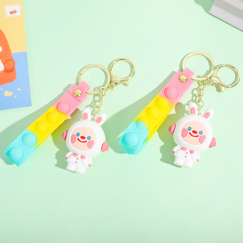 PVC soft rubber keychain, small pendant, doll wholesale, car key chain, hanging decoration, space rabbit cartoon keychain Specification image