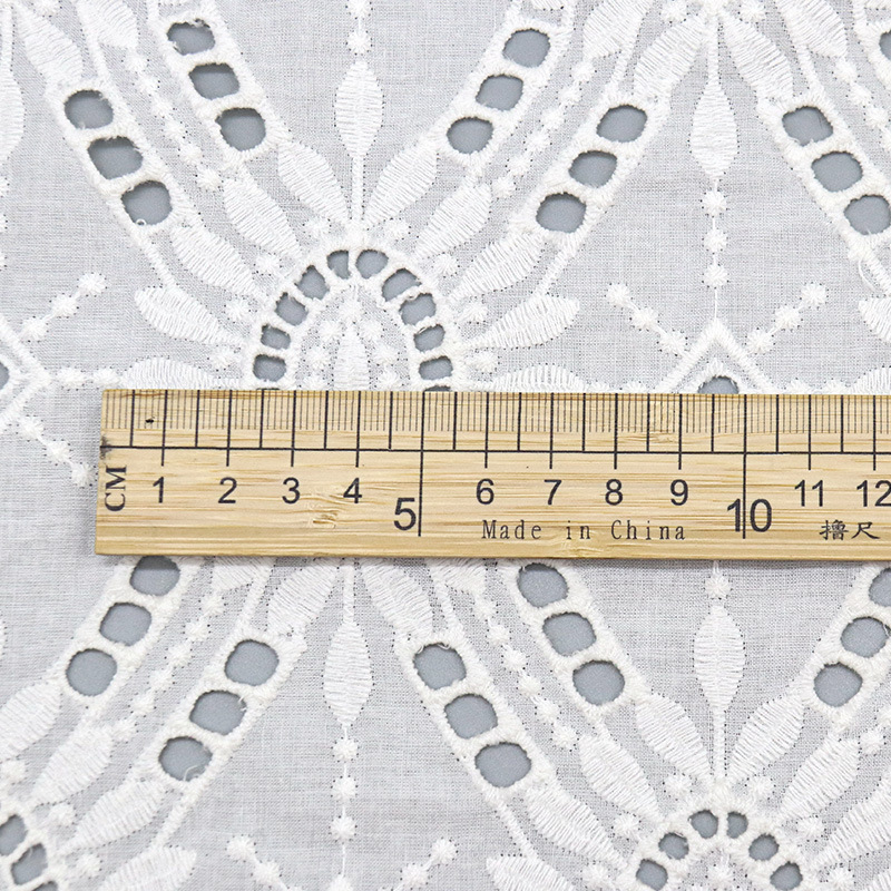 All-cotton embroidered fabric in stock, fashionable home textiles, children's wear, wedding gowns, evening gowns, halter straps, and lace fabric with hollowed-out patterns Specification image