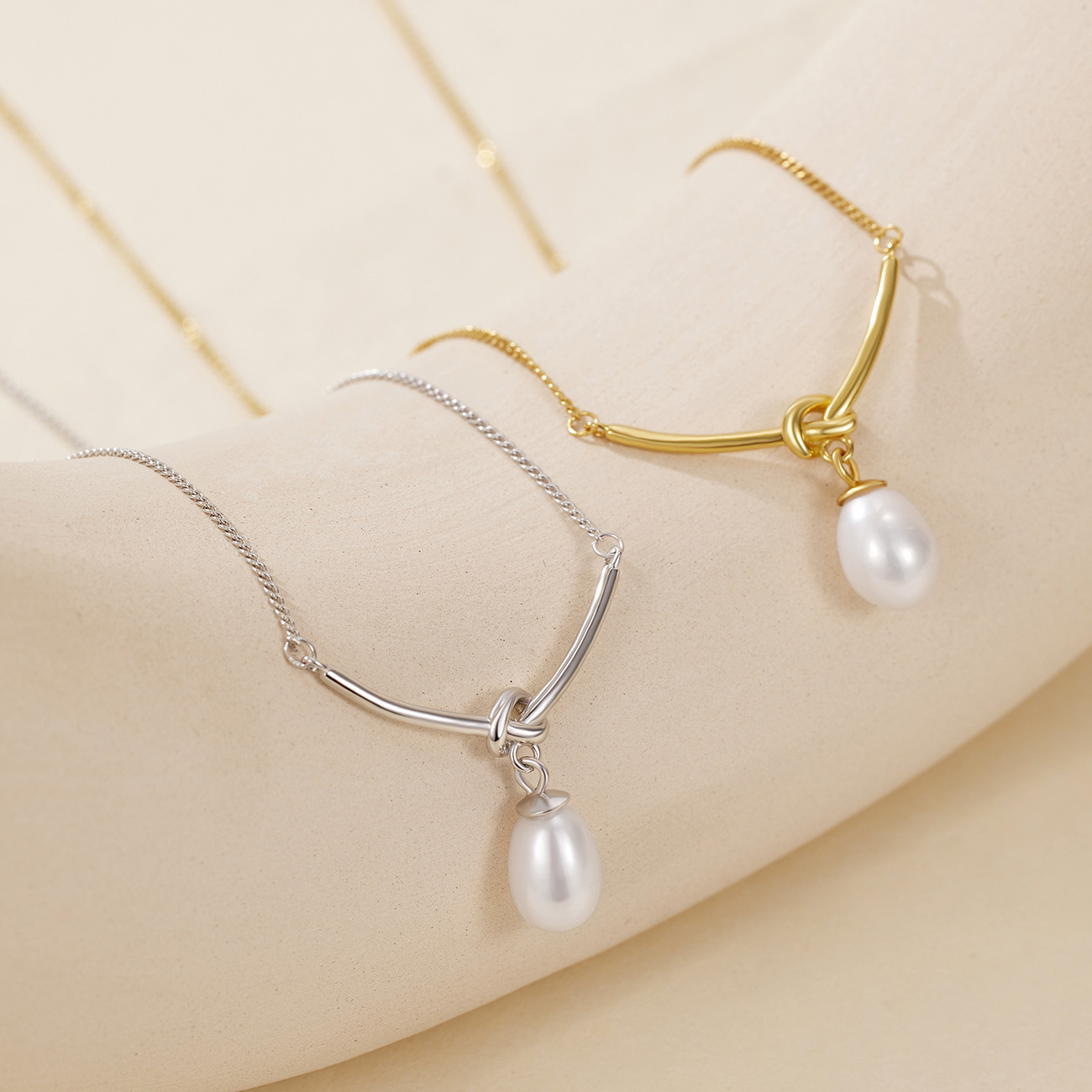 Silver knot freshwater pearl necklace, women's teardrop Korean version, simple and niche design silver jewelry wholesale full figure