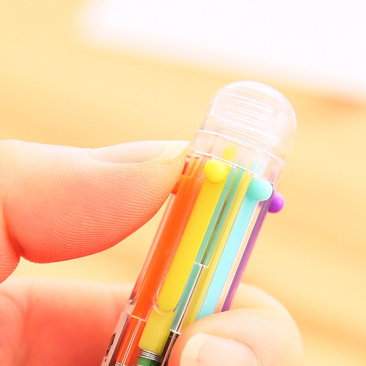 Wholesale of colorful and cute plastic creative transparent six-color ballpoint pens, multi-color pens, all-in-one gel pens Application Scenario