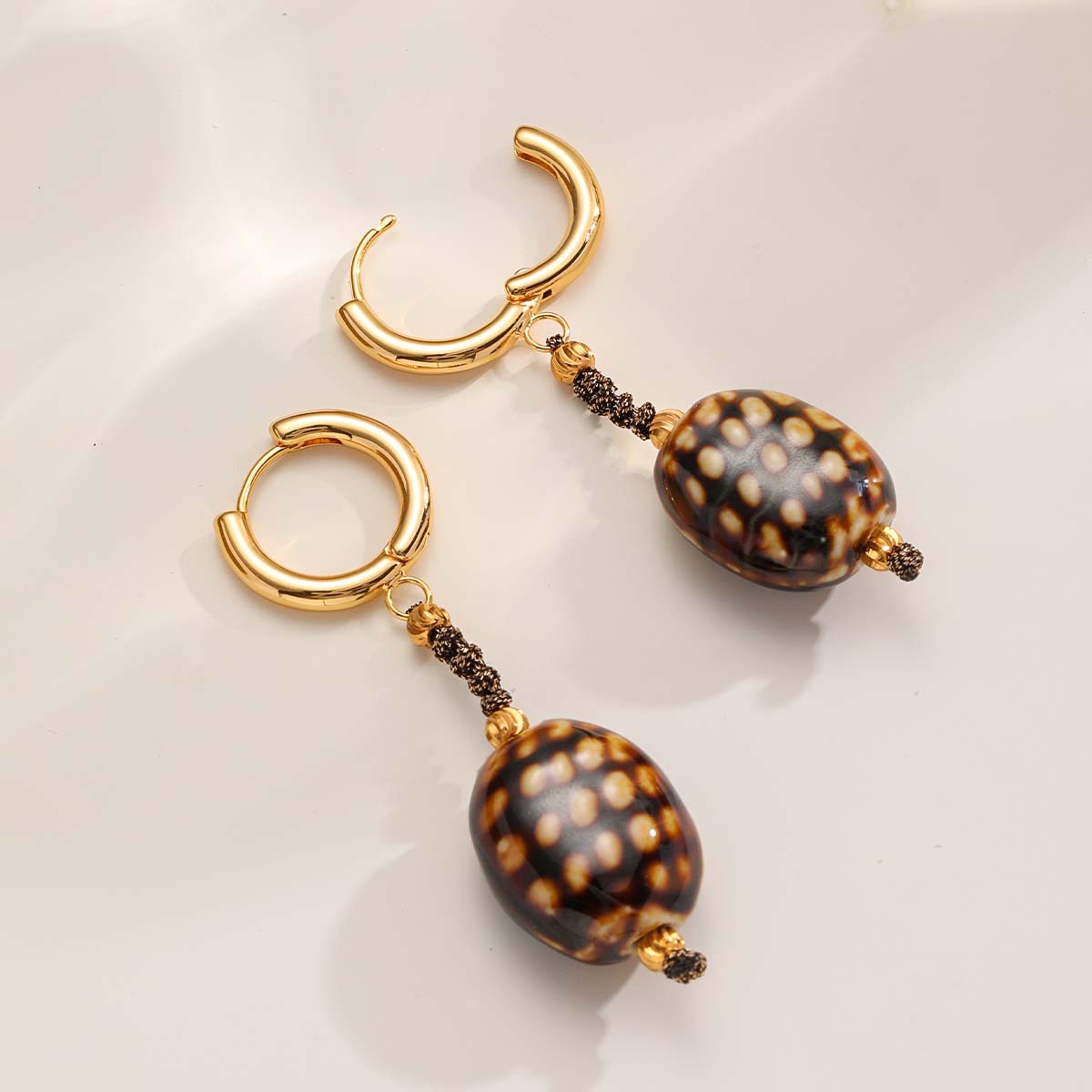 Nasha's cross-border Maillard ceramic earrings, circular ear buckles and earrings, are simple, fashionable, artistic and retro accessories for women Application Scenario