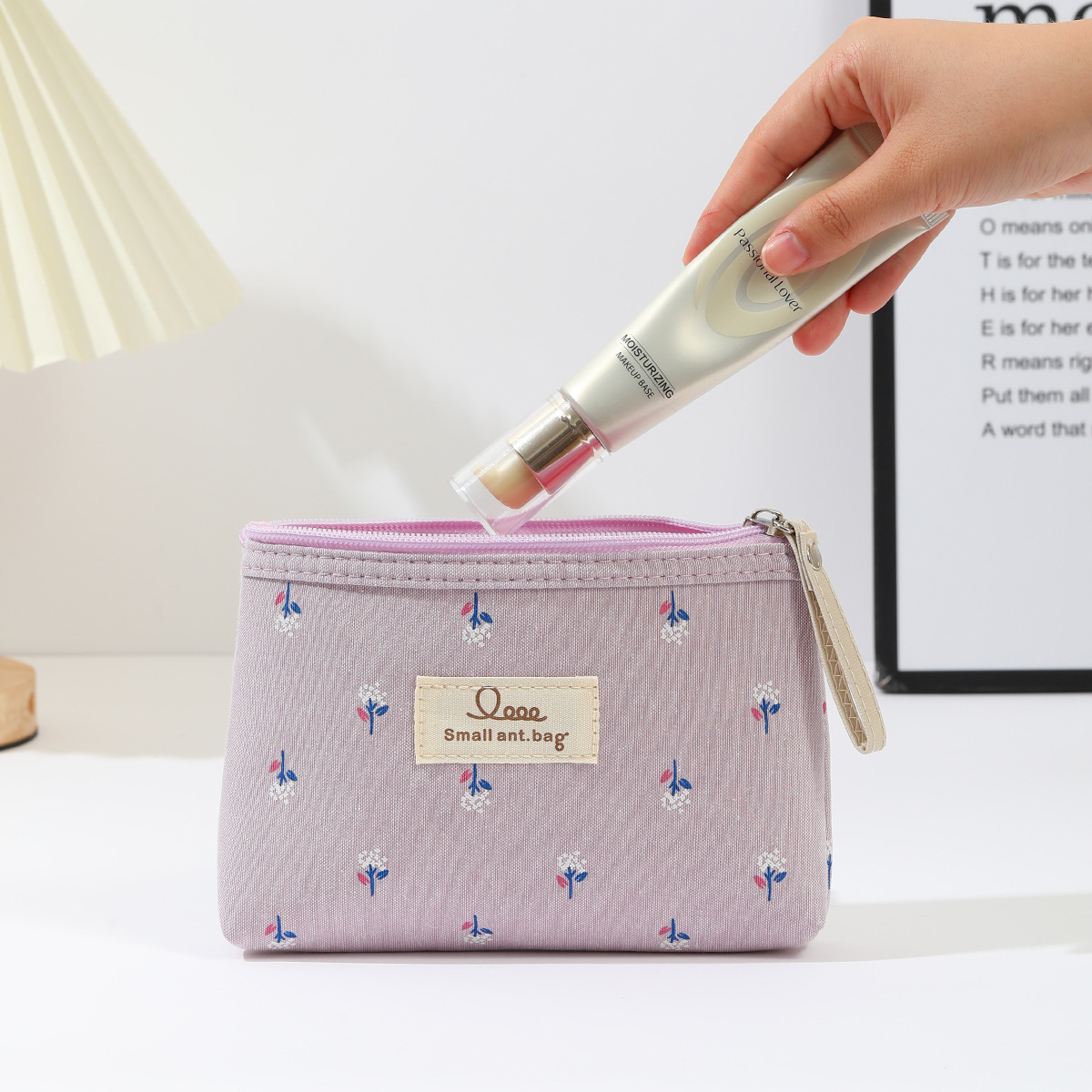 Cross-border printed canvas cosmetic bag, waterproof portable for women, Ins-style letter student pen case, travel storage toiletry bag Application Scenario
