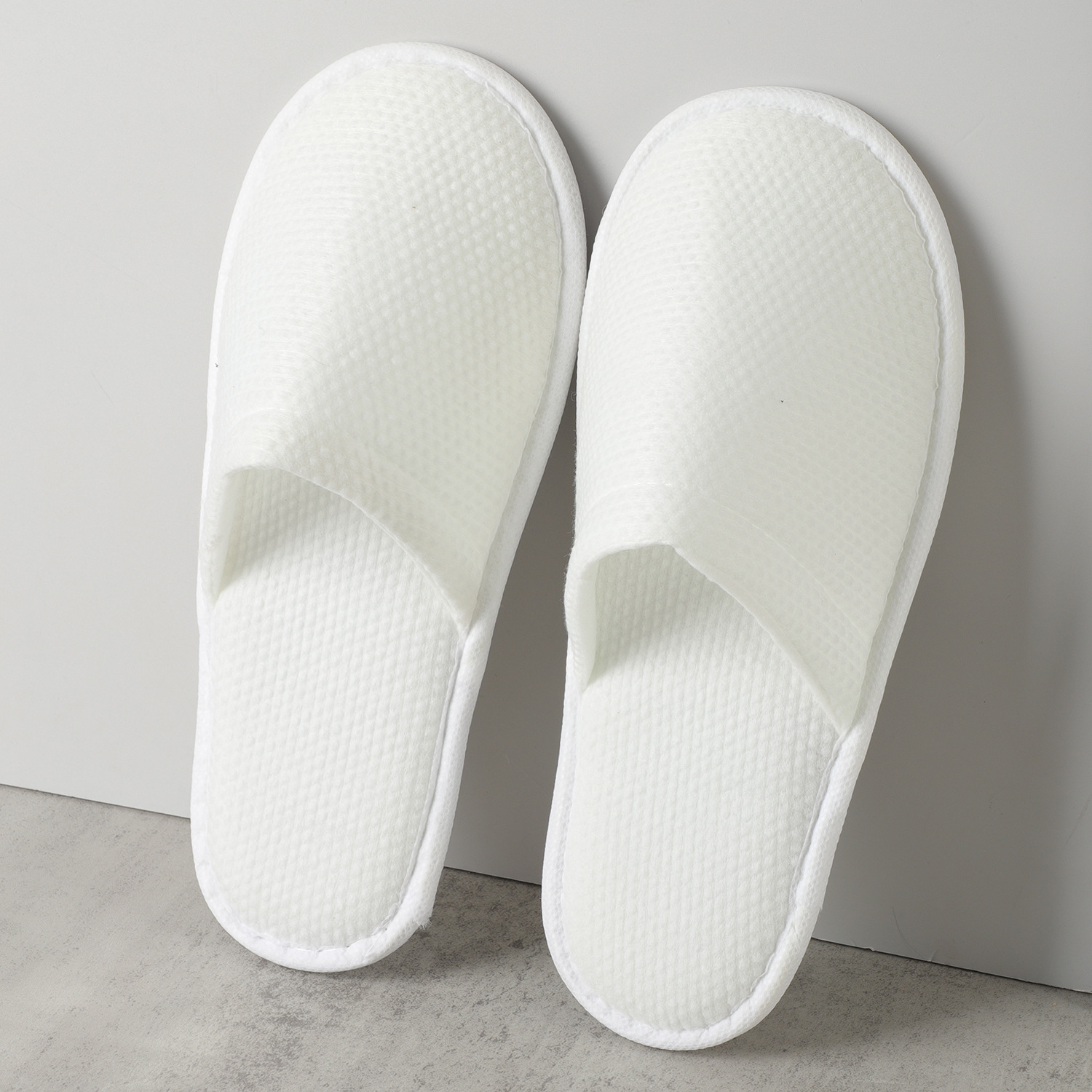 Wholesale of large-sized and thickened disposable pearl cotton slippers for hotels, homestays, travelers and guests
