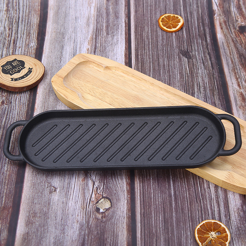 Cast iron outdoor steak teppanyaki double-ear oval induction cooker barbecue plate, household pine board fish frying and grilled meat plate Specification image