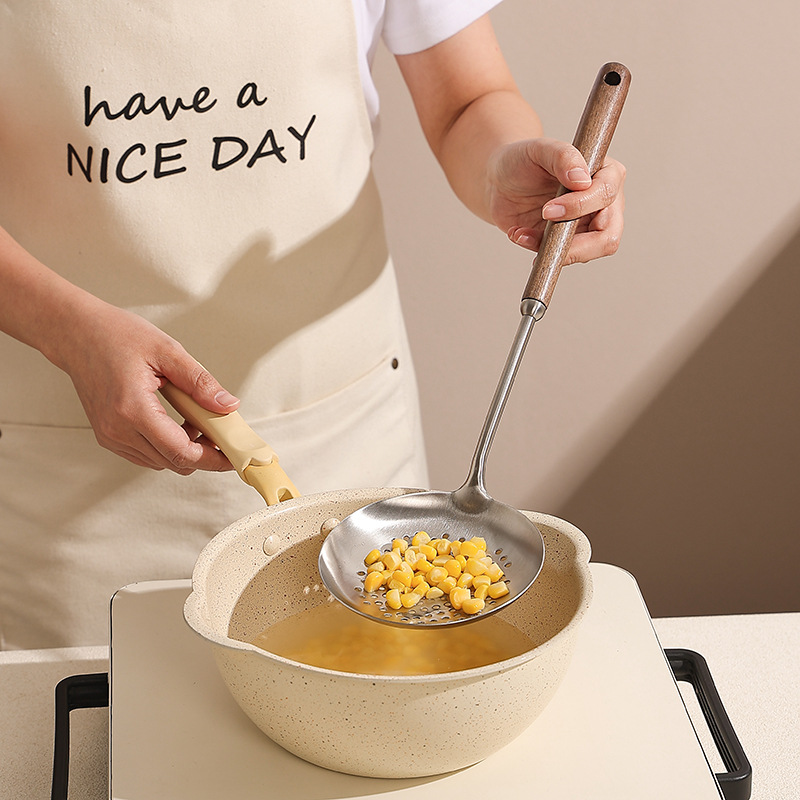Stainless steel kitchenware set with a strainer, soup spoon, spatula, wooden handle, smooth soup shell and soup drain Application Scenario