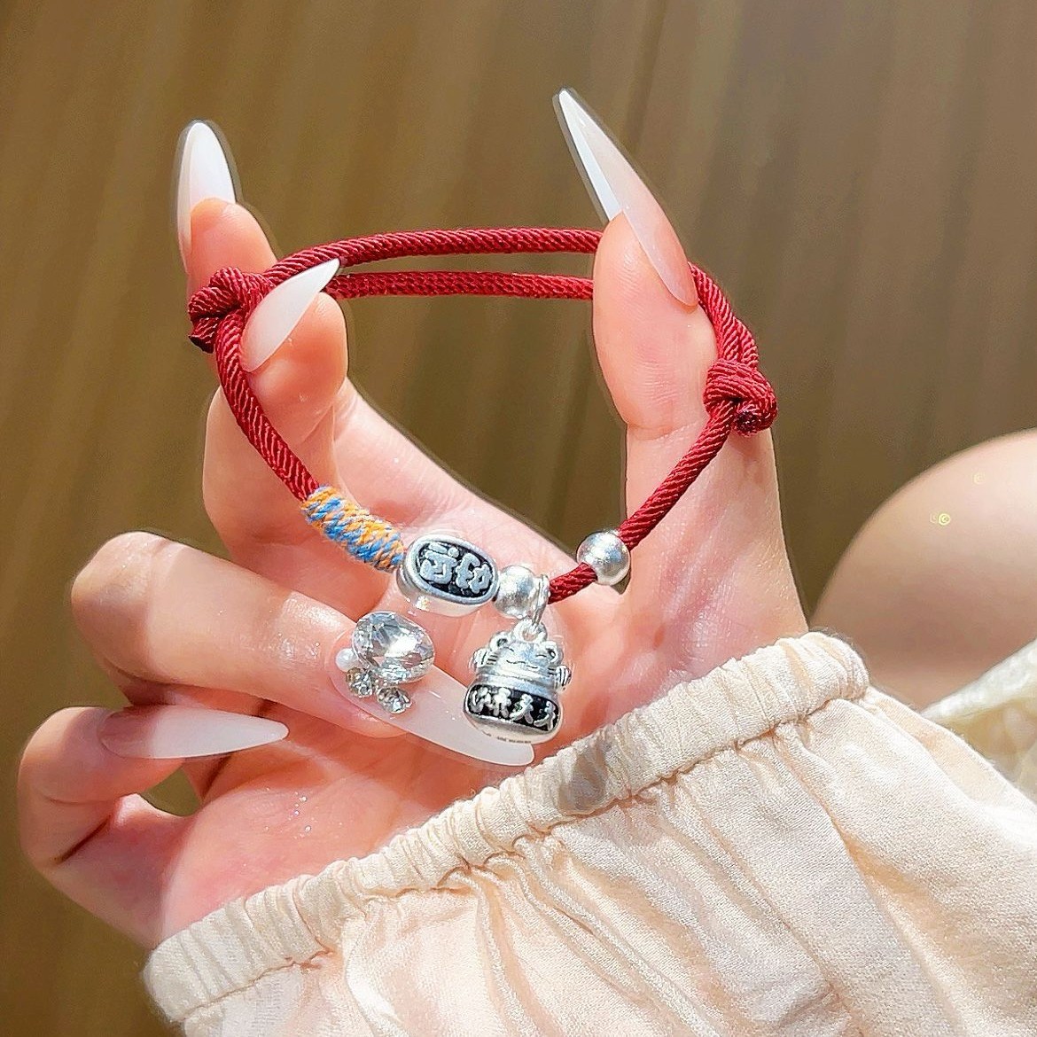 "Everyday Happiness Maneki Neko Zodiac Year Antique woven red rope bracelet, national trend Niche design, couple copper plated with hidden silver. full figure