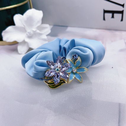 Fansi's new bowknot women's style original design oil painting process thick sausage ring simple and elegant back head sausage ring details Picture