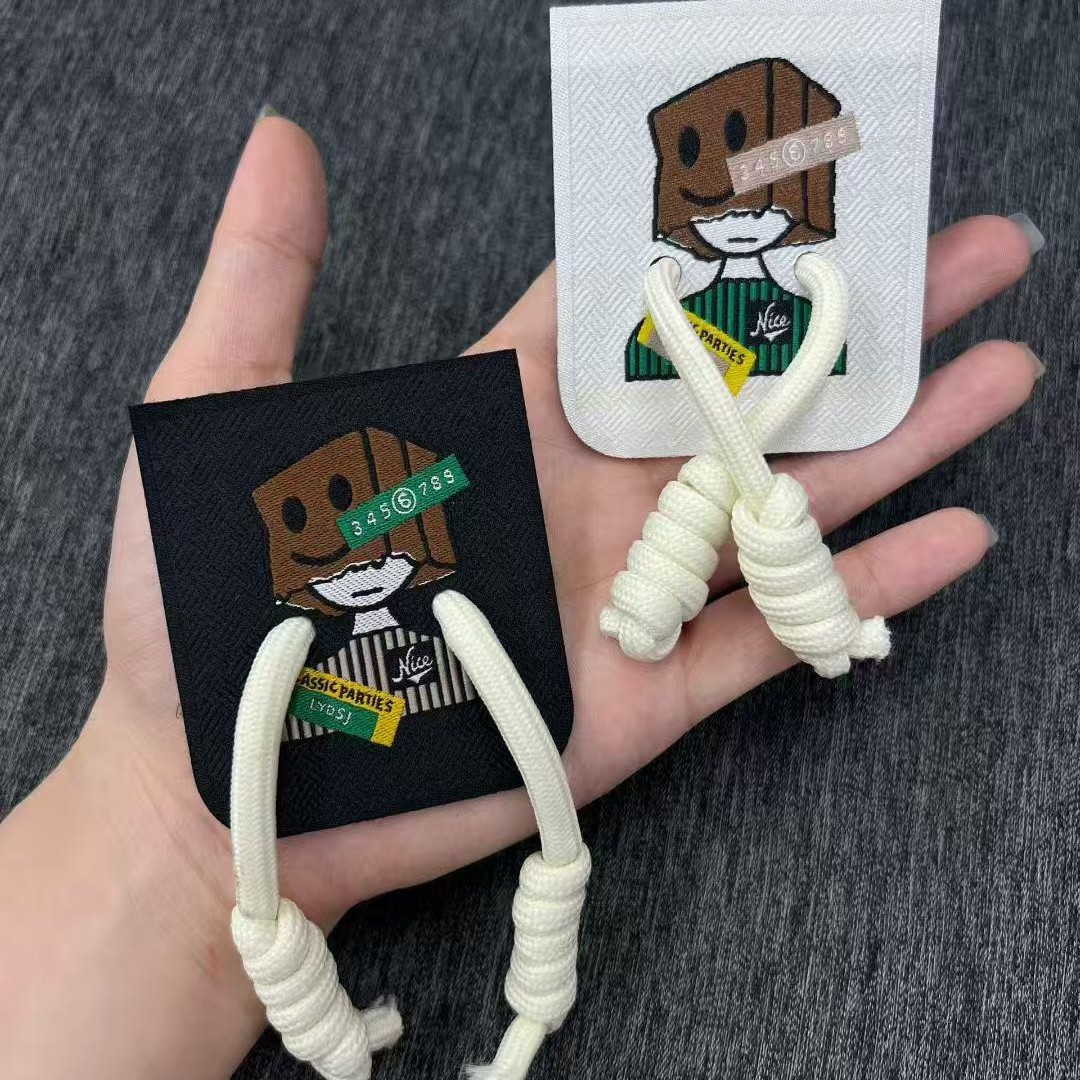 Wholesale of new trendy original cartoon patchwork clothing accessories, children's clothing, bags, decorative trademarks, cute woven labels, and fabric labels details Picture