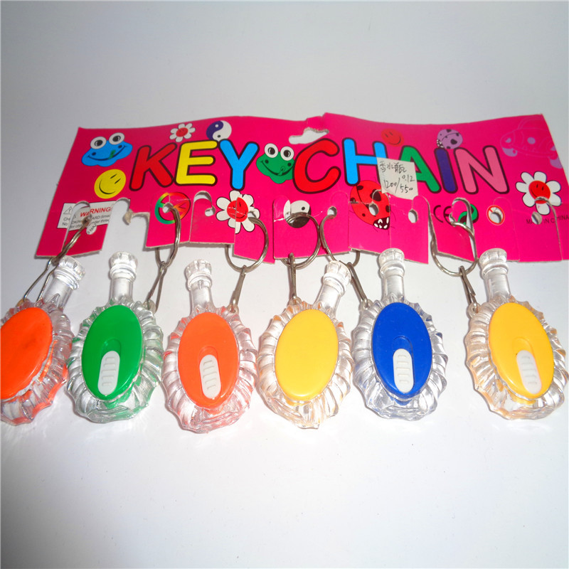 Yiwu children's plastic toys, new illuminated small gifts, LED keychains, night lights, perfume bottles, manufacturer wholesale