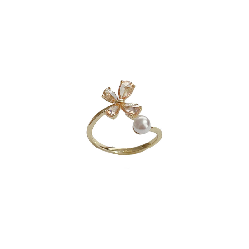 This unique and ethereal orange butterfly pearl open-mouth ring exudes a sense of luxury and sophistication, making it a fashionable and versatile index finger ring Application Scenario