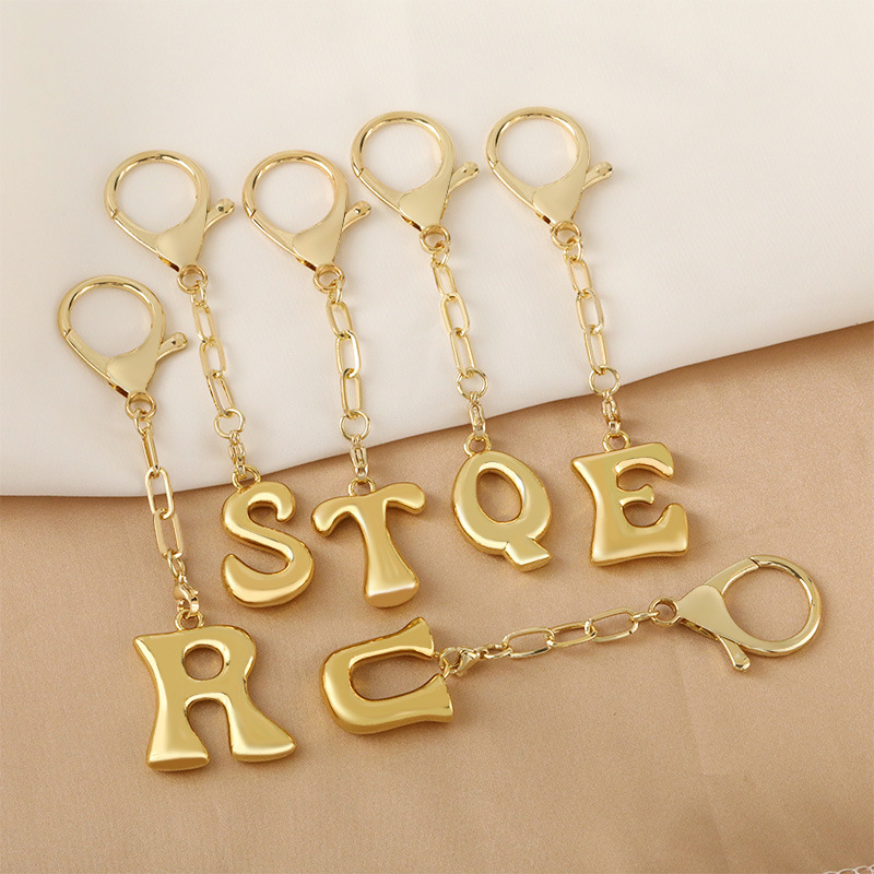 Cross-border bestseller 26-letter keychain pendant, 18K real gold electroplated, niche design, high-end charm Specification drawing
