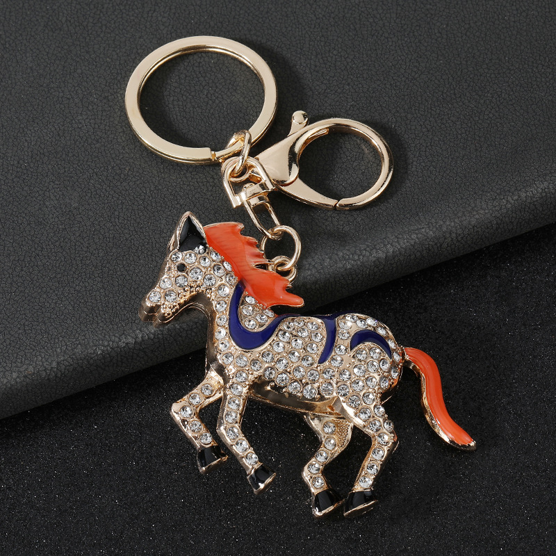 钥匙扣/钥匙扣公仔挂件/流沙入油玩具/挂饰/琥珀钥匙扣产品图