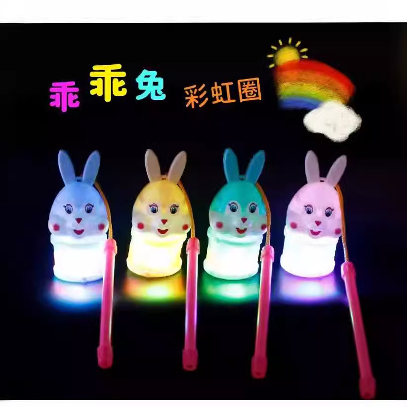 The 2023 Year of the Rabbit hand-held lantern rainbow ring cartoon rabbit luminous elastic rainbow ring spring ring toy is selling well Specification image