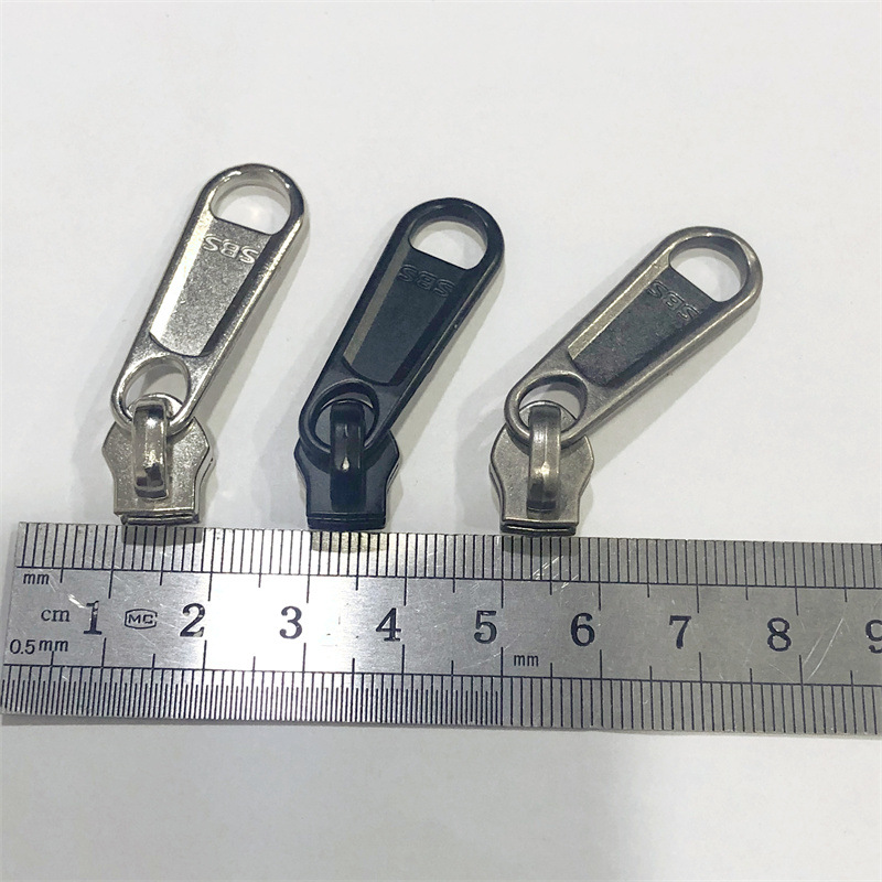 sbs luggage zipper pulls No. 5 and No. 8 long pieces, black and white, are in stock and available for wholesale. Outdoor tent pull lock pulls details Picture