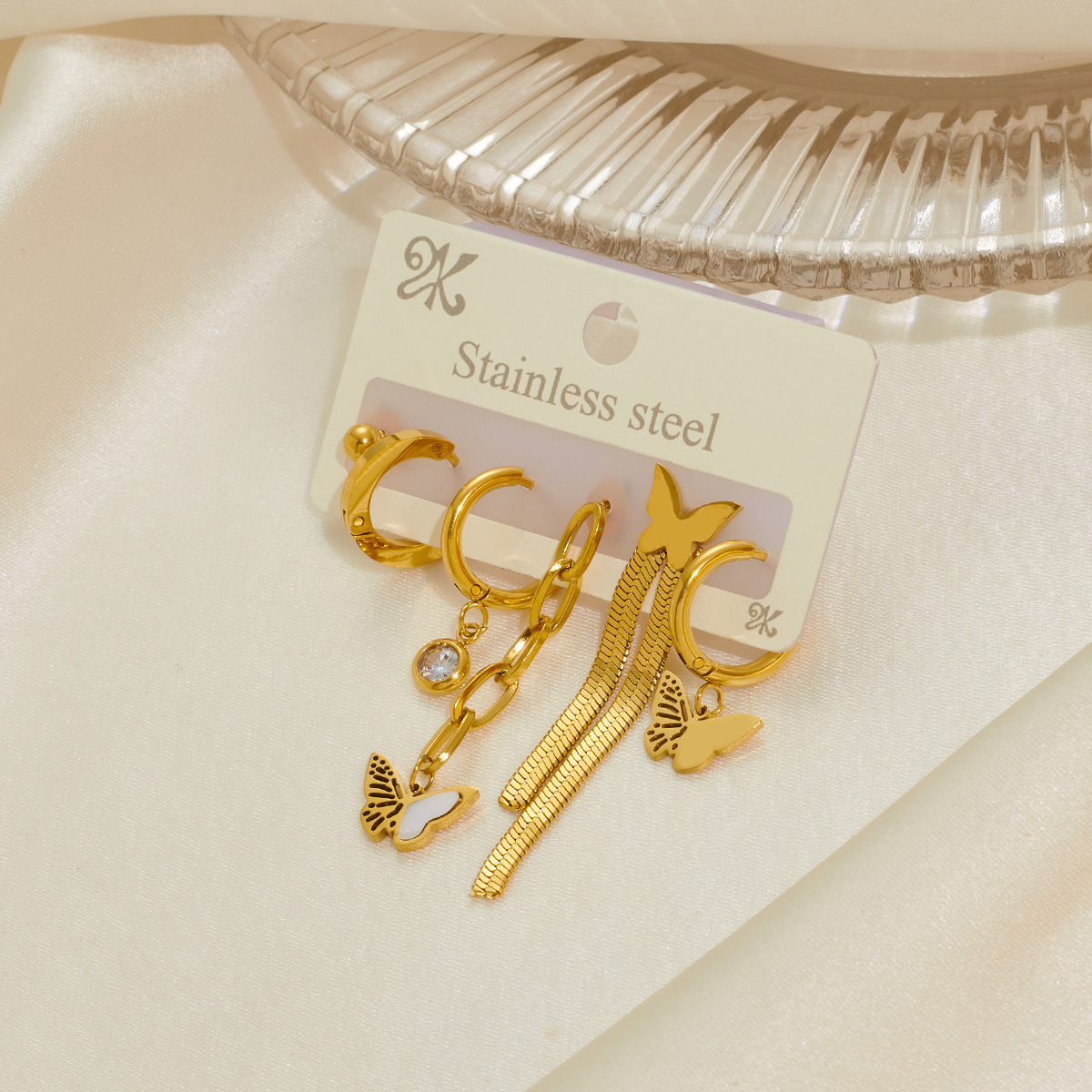 New titanium steel diamond-encrusted earring set, simple and fashionable hollowed-out star and moon drop earrings, women's factory wholesale details Picture
