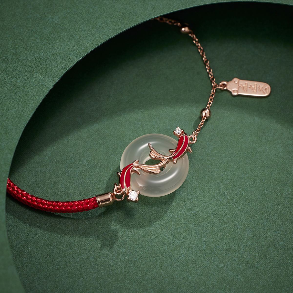 The ashore koi peace pendant with a red string and natural chalcedony is a fashionable and versatile jewelry for the zodiac year Specification image